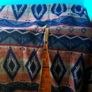 Very fuzzy and extremely  comfortable poncho/shaw